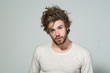 © Volodymyr - sleepy man with long uncombed hair wake up in morning