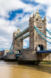 © daliu - Tower Bridge in London, the UK. Sunset with beautiful clouds. Drawbridge opening. One of English symbols