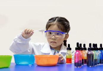 asian kid learn chemical lab