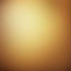 Light golden brown abstract background with radial gradient effect