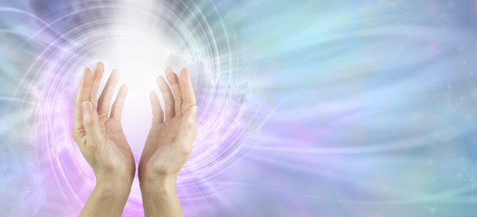 Wall Mural - Channeling Vortex healing energy  - female hands reaching up with white vortex energy formation and pink blue ethereal energy field  background