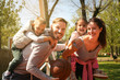© liderina - Happy family outdoor with basketballs.