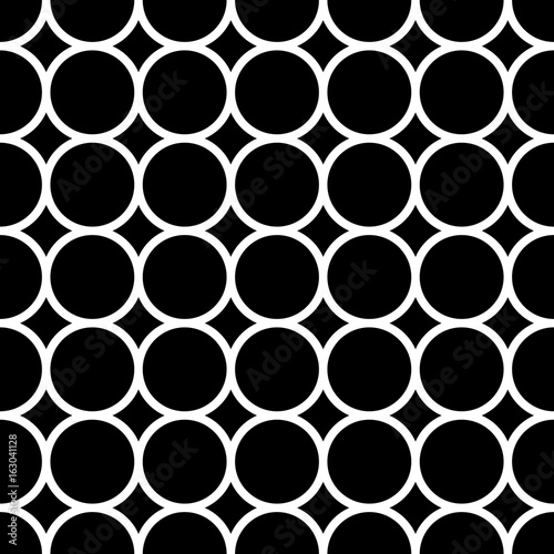 Simple repeating texture with circles. Vector seamless pattern.