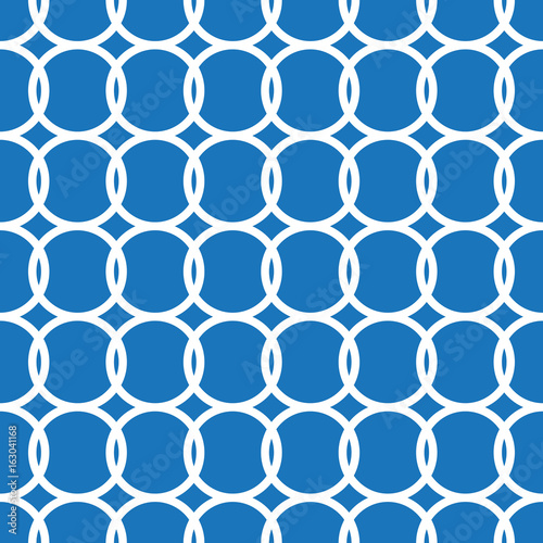 Simple repeating texture with circles. Vector seamless pattern.