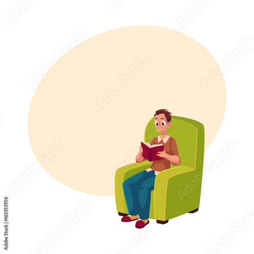 Young Man Boy Reading Book Sitting Comfortably In Armchair