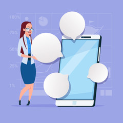 Poster - Business Woman Stand With Big Cell Smart Phone Social Network Communication Businesswoman With Chat Bubble Flat Design Vector Illustration
