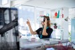 © wavebreak3 - Female designer using virtual reality headset