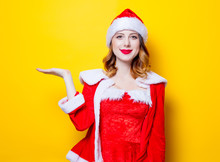 Young Santa Claus Girl In Red Clothes