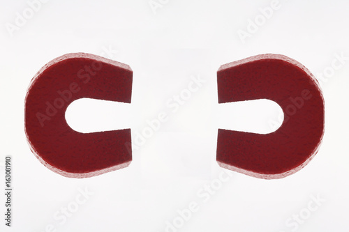 Fotografie, Tablou Two Red Magnets on White Background