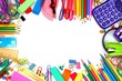 © Jenifoto - Colorful school supplies frame against a white background