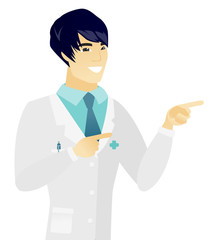 Poster - Young asian doctor pointing to the side.