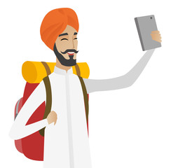 Poster - Hindu traveler man with backpack making selfie.