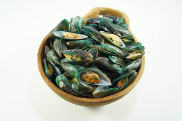 Wall Mural - Stream mussels seafood top view in wooden bowl isolated white background