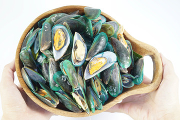 Wall Mural - Stream mussels seafood top view in wooden bowl isolated white background