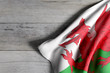 Wales flag on wooden surface