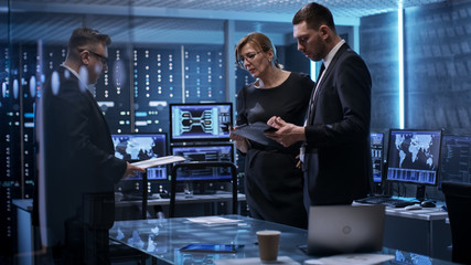 Aufkleber - Team of Corporate Managers Having Meeting in Monitoring Room. They're in State of the Art Facility. Computers have Animated Screens.