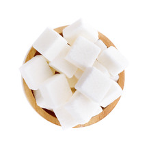 Sugar Cube In Wooden Bowl On White Background