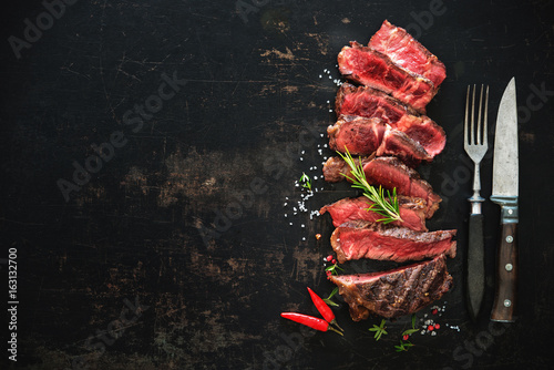 Sliced medium rare grilled beef ribeye steak - Buy this stock ...