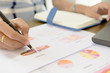 © KPs Photography  - Businessman check seriously analyzes a financial reports. Financial reports are set of documents prepared by an administrative team at the end of an accounting period.