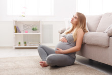 Pensive Pregnant Woman Dreaming About Child