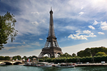 view of eiffel tower across the river seine