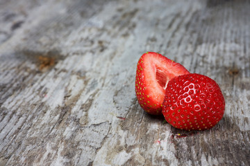 strawberries on the brown wooden table