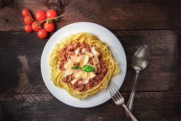 Pasta bolognese on rustic background with copyspace