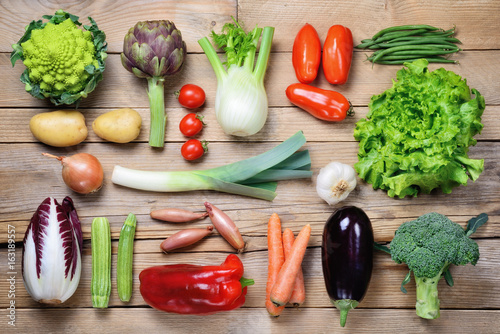 Stampa su Tela Selection of raw vegetables on wood background