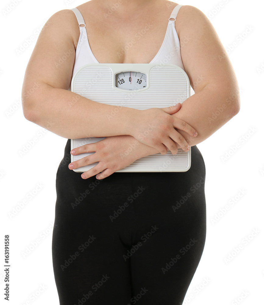 Overweight woman holding scales on white background. Diet concept