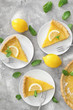 Tasty homemade lemon pie pieces served on plates