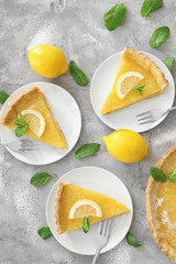 Wall Mural - Tasty homemade lemon pie pieces served on plates