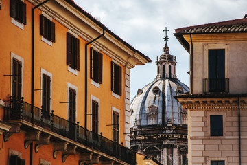 Street in Rome at summer daytime. Italy, Europe