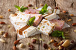 French fresh nougat with nuts and pumpkin seeds close-up. horizontal