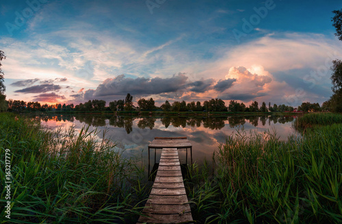 Landscape on the bridge at sunset Poster