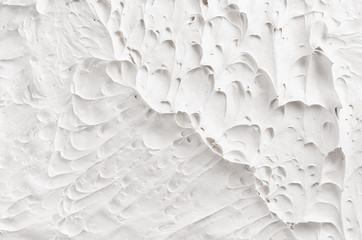 Wall Mural - White decorative abstract plaster texture with craters and ripple.