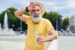 © ArtFamily - Candid bearded man standing with plastic bottle