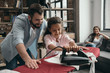 © LIGHTFIELD STUDIOS - smiling father with little daughter ironing clothes at home