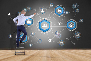 Poster - businessman in front of a wall with an international business network connection displayed on a futu