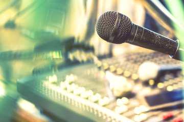 The microphone on the audio mixer. In the recording studio.