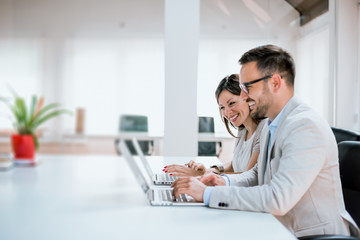 Wall Mural - Image of two successful business partners working in the office