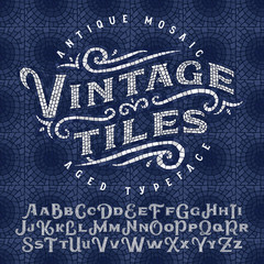 Wall Mural - Vintage antique mosaic typeface made of hundreds of aged tiles. With seamless background pattern.