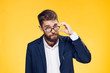 © SHOTPRIME STUDIO - Business man with a beard on a yellow background, portrait
