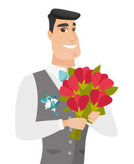 Wall Mural - Young caucasian groom with bridal bouquet.