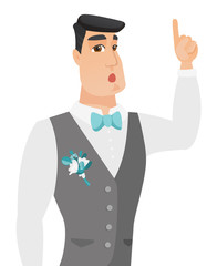 Sticker - Young groom with open mouth pointing finger up.