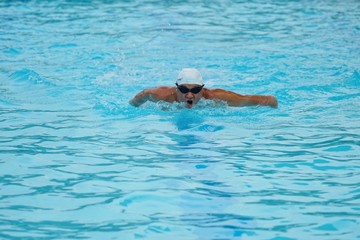 Canvas Print - Elderly swimming is a healthy exercise that maintains health.