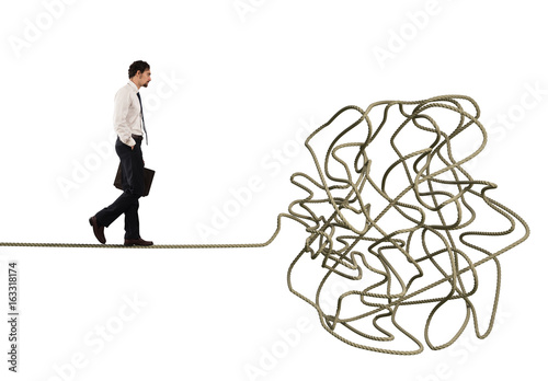 Fotografie, Obraz Problem and difficulty concept with tangled rope
