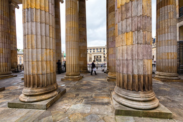 BOGOTA, COLOMBIA - JUNE 14: An unidentified man walks between the pillars at the Capitolio Nacional in Bogota, Colombia on June 14, 2016.