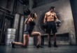 Couple training in a gym