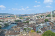 Top view of the beautiful old city with red-tiled roofs and spires