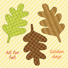 Cute handmade autumn leaves as retro fabric applique